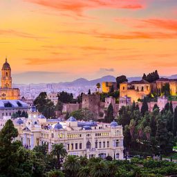 Malaga, Spain cityscape at the Cathedral, City Hall and Alcazaba citadel of Malaga.